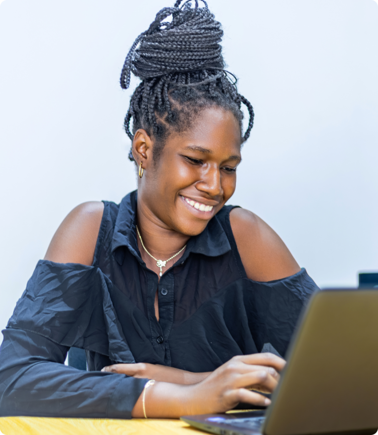 Portrait of a student working on a laptop